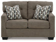 Ashley Furniture Mahoney loveseat featuring plush fabric upholstery and cushioned seating for comfortable living room decor.