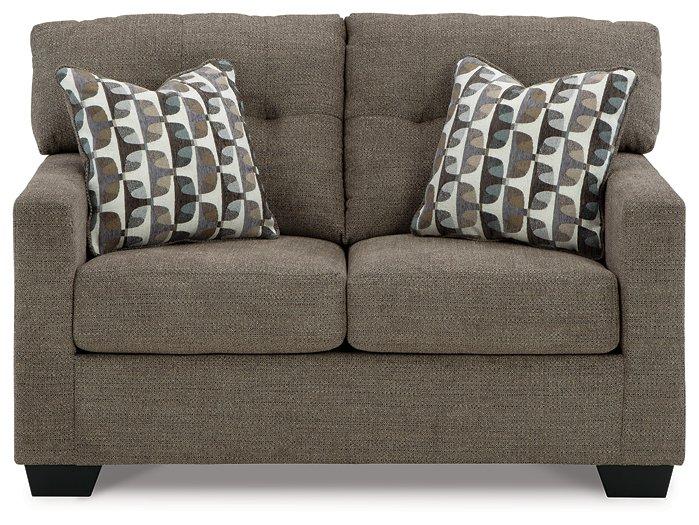 Ashley Furniture Mahoney loveseat featuring plush fabric upholstery and cushioned seating for comfortable living room decor.