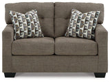Ashley Furniture Mahoney loveseat featuring plush fabric upholstery and cushioned seating for comfortable living room decor.
