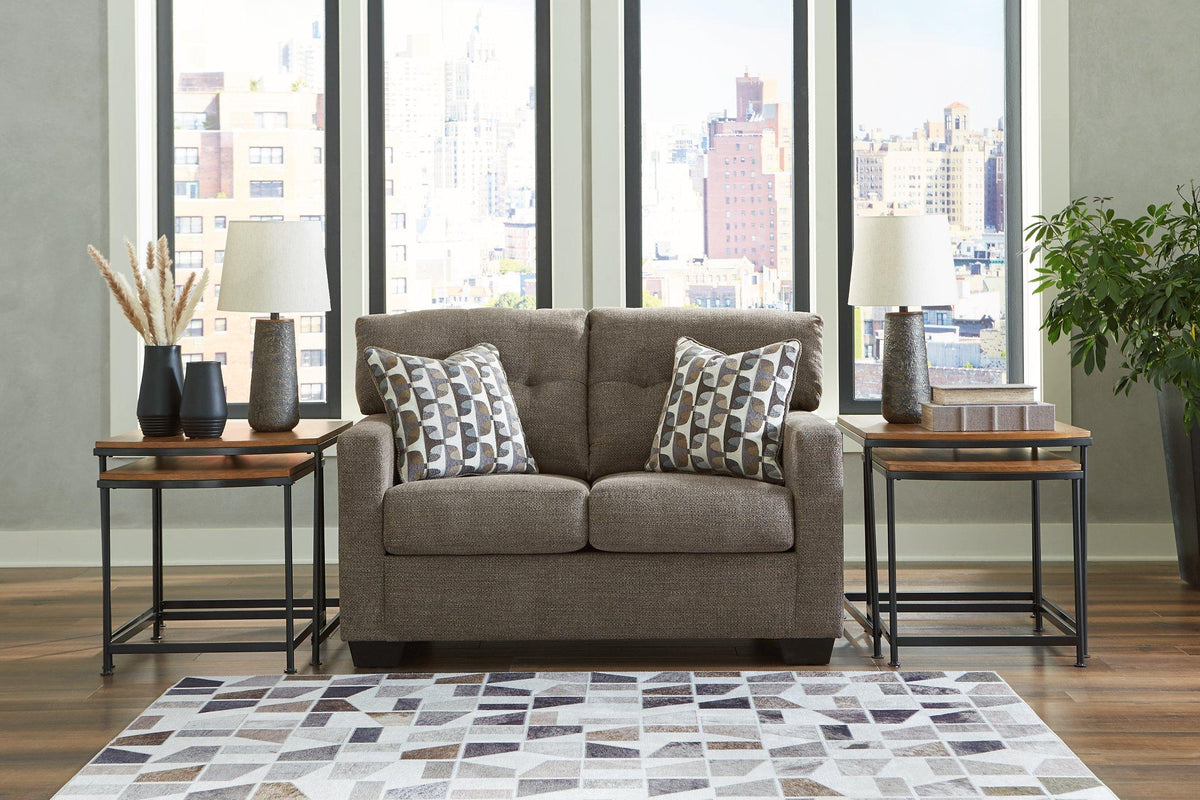 Ashley Mahoney loveseat with plush fabric and cushioned seats, perfect for cozy living room seating.