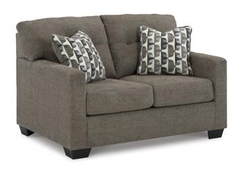 Ashley Furniture Mahoney loveseat with plush fabric and cushioned armrests, perfect for a cozy living room seating area.