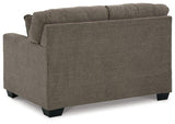 Mahoney loveseat by Ashley Furniture, featuring plush upholstery and a cozy, stylish living room setting.
