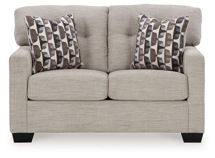 Ashley Furniture Mahoney loveseat with plush fabric and modern design, perfect for cozy living room seating.