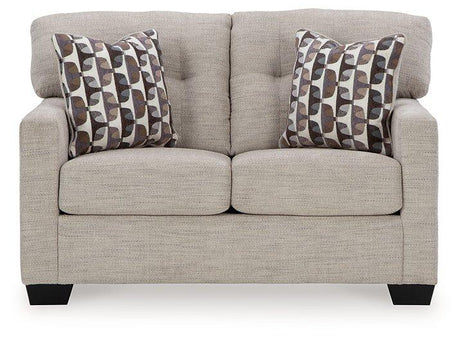 Ashley Furniture Mahoney loveseat with plush fabric and modern design, perfect for cozy living room seating.