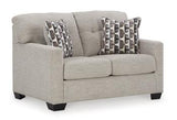 Ashley Furniture Mahoney loveseat with plush fabric and cushioned arms, perfect for comfortable living room seating.