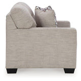 Ashley Mahoney loveseat with plush fabric and cushioned arms, perfect for cozy living room seating.