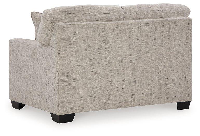 Ashley Furniture Mahoney loveseat with plush fabric, padded arms, and comfortable cushions for cozy living room seating.