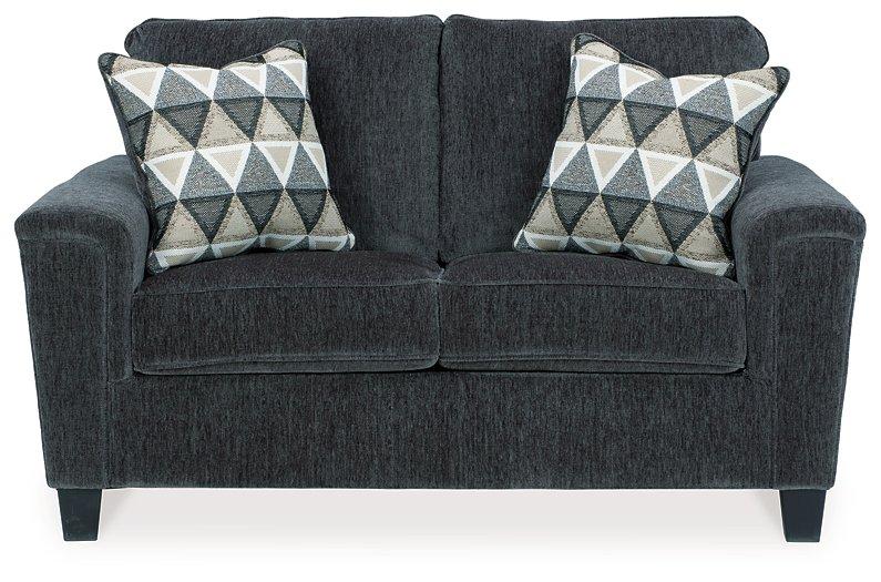 Ashley Furniture Abinger loveseat with plush fabric and cushioned armrests, perfect for cozy living room seating.