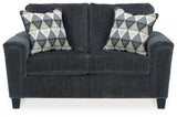 Ashley Furniture Abinger loveseat with plush fabric and cushioned armrests, perfect for cozy living room seating.