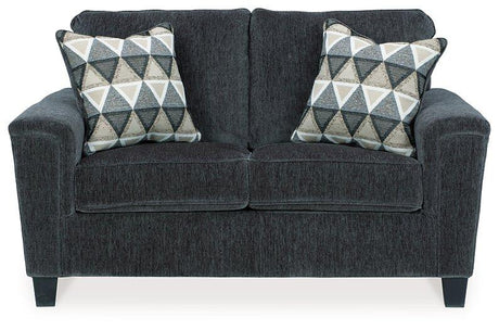 Ashley Furniture Abinger loveseat with plush fabric and cushioned armrests, perfect for cozy living room seating.