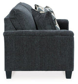 Ashley Furniture Abinger loveseat with plush cushions and neutral upholstery, perfect for cozy living room seating.