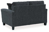 Ashley Furniture Abinger loveseat with plush fabric and cushioned armrests, perfect for cozy living room seating.