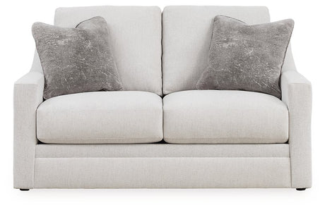 Ashley Furniture Adda loveseat with plush cushions and modern design, shown from a head-on view.
