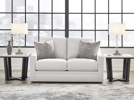 Ashley Furniture Adda Loveseat with plush fabric and modern design, shown in a cozy living room setting.