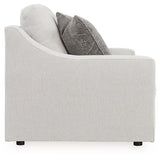 Ashley Furniture Adda Loveseat with plush fabric and cushioned armrests, shown from a side angle.