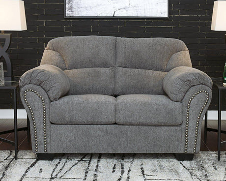 Allmaxx loveseat by Ashley Furniture, featuring plush upholstery and modern design, shown in a cozy living room setting.