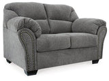 Ashley Furniture Allmaxx loveseat with plush beige upholstery and cushioned backrest, perfect for cozy living room seating.
