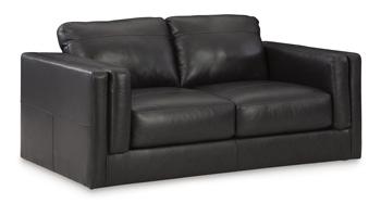Ashley Furniture Amiata loveseat with plush fabric and cushioned seats, perfect for cozy living room seating.