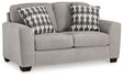 Ashley Furniture Avenal Park loveseat with plush cushions and neutral fabric, perfect for cozy living room seating.