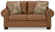 Ashley Furniture Carianna loveseat with plush upholstery and cozy armrests, shown from a front head-on view.