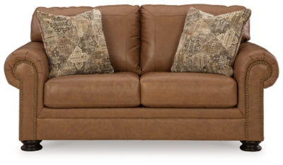 Ashley Furniture Carianna loveseat with plush upholstery and cozy armrests, shown from a front head-on view.
