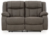 Ashley Furniture First Base reclining loveseat with plush cushions and reclining features, shown in a head-on view.