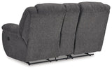 Ashley Furniture Foreside Reclining Loveseat with Console showing plush fabric, built-in cup holders, and ergonomic design.