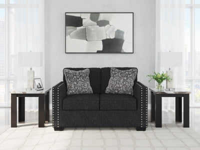 Ashley Furniture Jasmine Peaks loveseat with plush upholstery and decorative pillows, perfect for cozy living room seating.