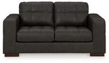 Ashley Furniture Luigi Loveseat with plush fabric, contemporary design, and comfortable cushioning for stylish living room seating.