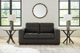 Ashley Furniture Luigi Loveseat with plush fabric and modern design, showcasing comfortable seating and stylish upholstery.