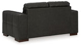 Ashley Furniture Luigi Loveseat with plush cushions and sleek design for modern living room decor.