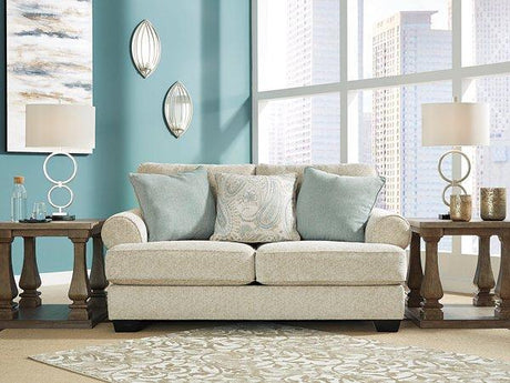 Ashley Monaghan loveseat with plush fabric and cushioned seating, ideal for cozy living room setups.