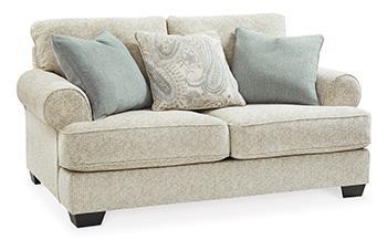 Ashley Furniture Monaghan loveseat with plush fabric and cushioned armrests, perfect for cozy living room seating