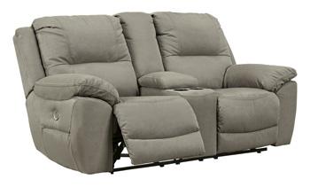 Next-Gen Gaucho Power Reclining Loveseat by Ashley Furniture with built-in console, plush fabric, and padded armrests.