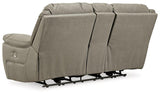 Ashley Furniture Next-Gen Gaucho Power Reclining Loveseat with console, featuring plush upholstery and built-in cup holders.