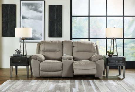 Ashley Furniture Next-Gen Gaucho Power Reclining Loveseat with Console, featuring plush upholstery and built-in cup holders.