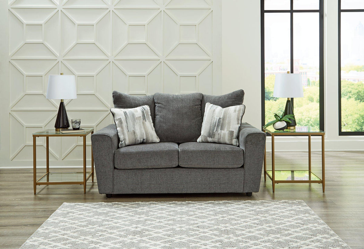 Stairatt loveseat by Ashley Furniture featuring plush cushions and modern design in a cozy living room setting.