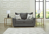 Stairatt loveseat by Ashley Furniture featuring plush cushions and modern design in a cozy living room setting.