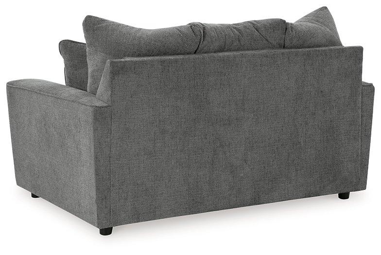 Ashley Furniture Stairatt loveseat with plush fabric, cushioned seats, and stylish design for cozy living room seating.