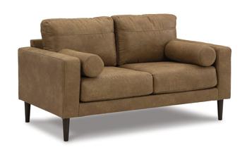 Ashley Telora loveseat with plush fabric upholstery and cushioned armrests, perfect for cozy living room seating.