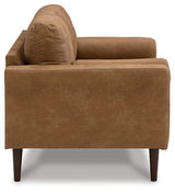 Ashley Telora Loveseat with plush fabric, cushioned armrests, and cozy seating in a modern living room setting.