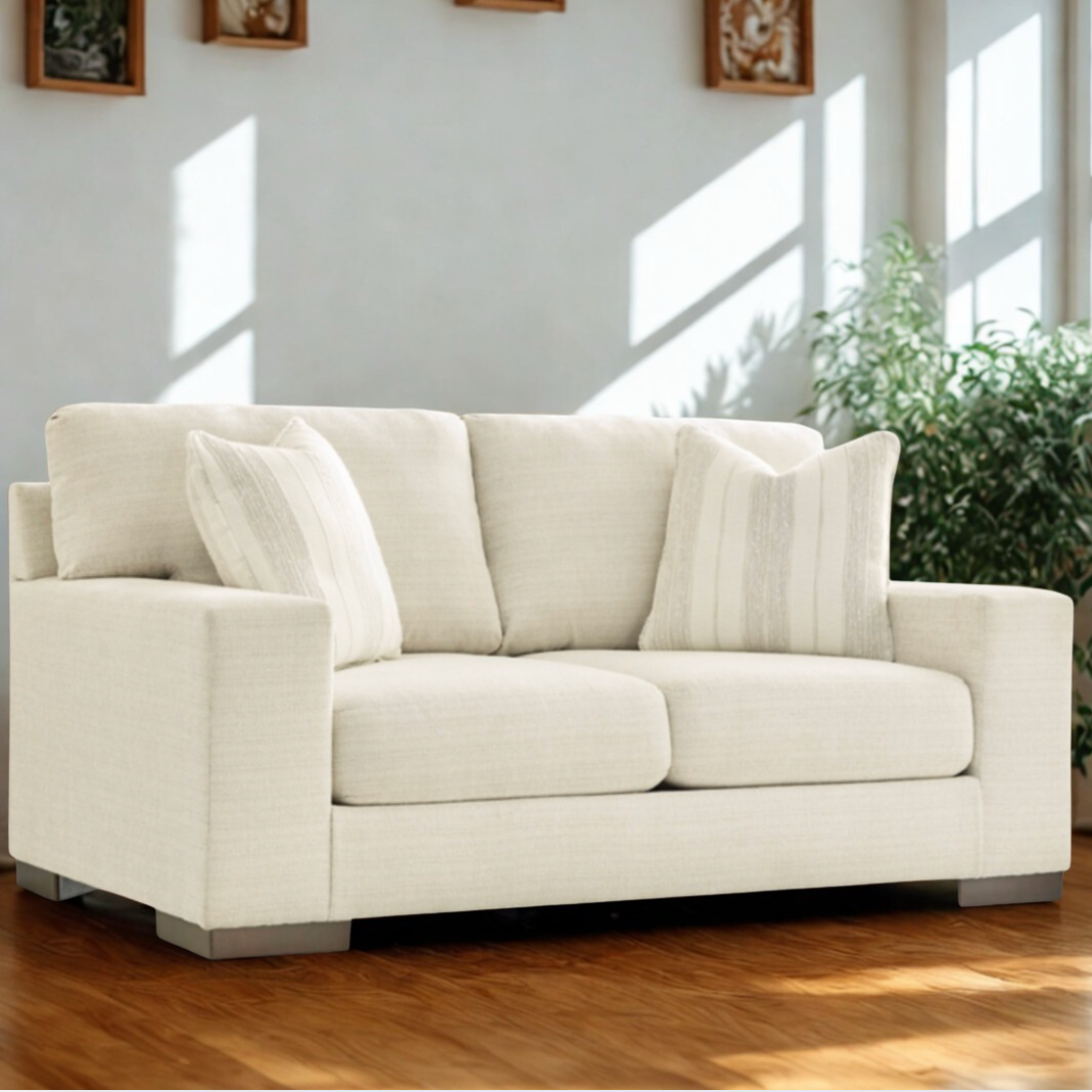 Ashley Furniture Newport Loveseat with plush upholstery and wooden legs, shown in a modern living room setting.