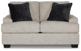 Ashley Vayda loveseat with plush fabric and modern design, featuring comfortable cushions and sleek armrests.