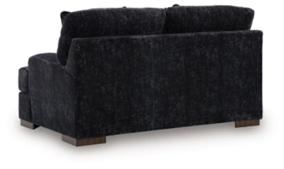 Ashley Furniture Whitmore Manor loveseat, beige fabric with tufted back and rolled arms, cozy seating for two.