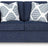 Ashley Furniture Evansley loveseat with plush fabric and cushioned arms, perfect for cozy living room seating.