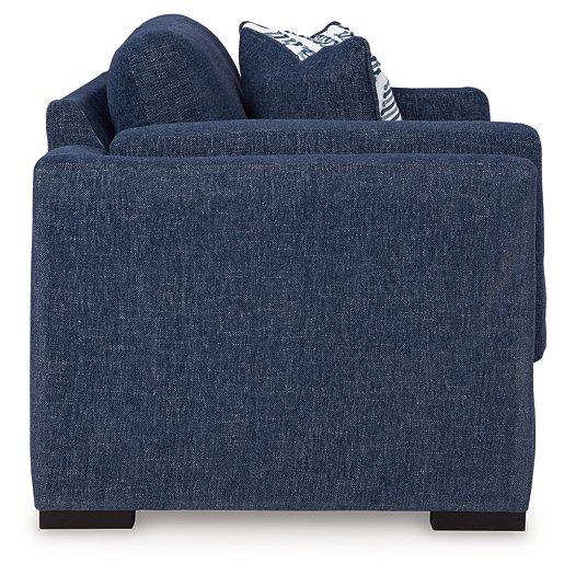 Ashley Furniture Evansley loveseat with plush cushions and a stylish fabric upholstery, perfect for cozy living room seating.