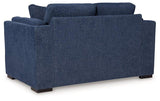 Ashley Furniture Evansley loveseat with plush fabric and cushioned arms, ideal for cozy living room seating.