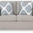 Ashley Furniture Evansley loveseat with plush fabric, cushioned back and armrests, in a cozy, stylish living room setting.