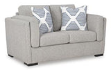 Ashley Furniture Evansley loveseat with plush fabric and cushioned arms, perfect for cozy living room seating.