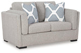 Ashley Furniture Evansley Loveseat with plush fabric and cushioned armrests, perfect for cozy living room seating.